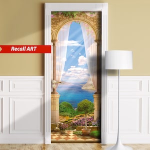 May include: A door decal featuring a picturesque view of a blue ocean and a rocky coastline seen through an arched doorway with white curtains. The scene is framed by a stone archway with ornate details.