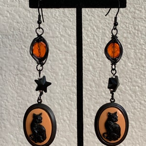 Black Cat Cameo Dangle Earrings-Handmade with Swarovski star, hand-wrapped glass beads, and silver Earwires. Perfect for Halloween!!