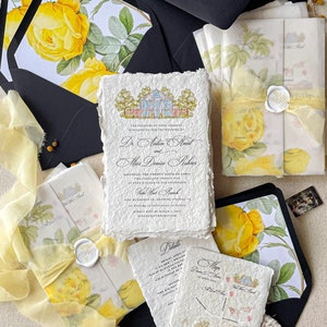 May include: Wedding invitation suite featuring a yellow rose design. The invitation includes a watercolour illustration of a house and the text "The pleasure of your company is requested for the wedding of Dr. Anton Hunt and Miss Denise Roberts". The details card includes the date, time, and location of the wedding. The map card features a hand-drawn map of the wedding venue.