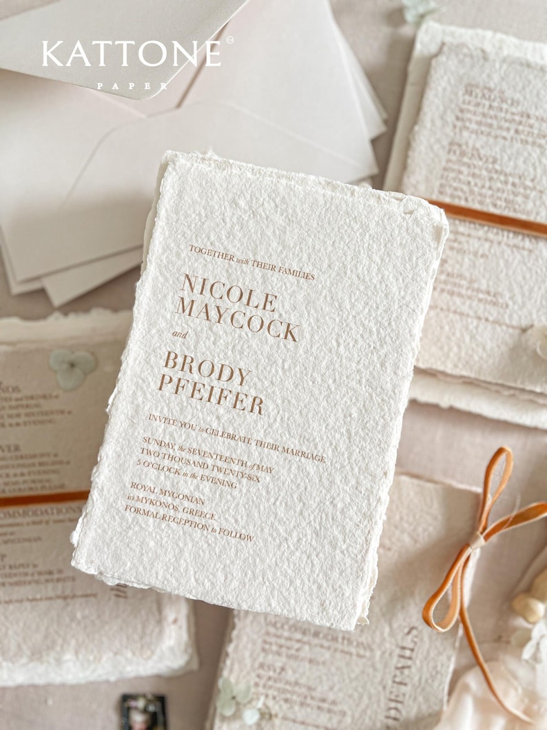 Luxury romantic wedding stationery suite with colored handmade cotton paper invitations, terracotta typography and elegant minimalist design.