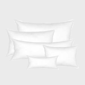 May include: Five white pillow inserts of different sizes stacked on top of each other. The pillows are all rectangular and have a smooth, white fabric cover.