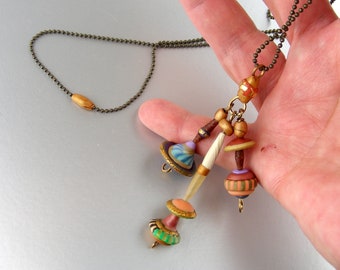 Bundled Relics necklace in polymer clay