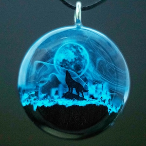 Wolf howling at the moon necklace, wood resin glowing pendant