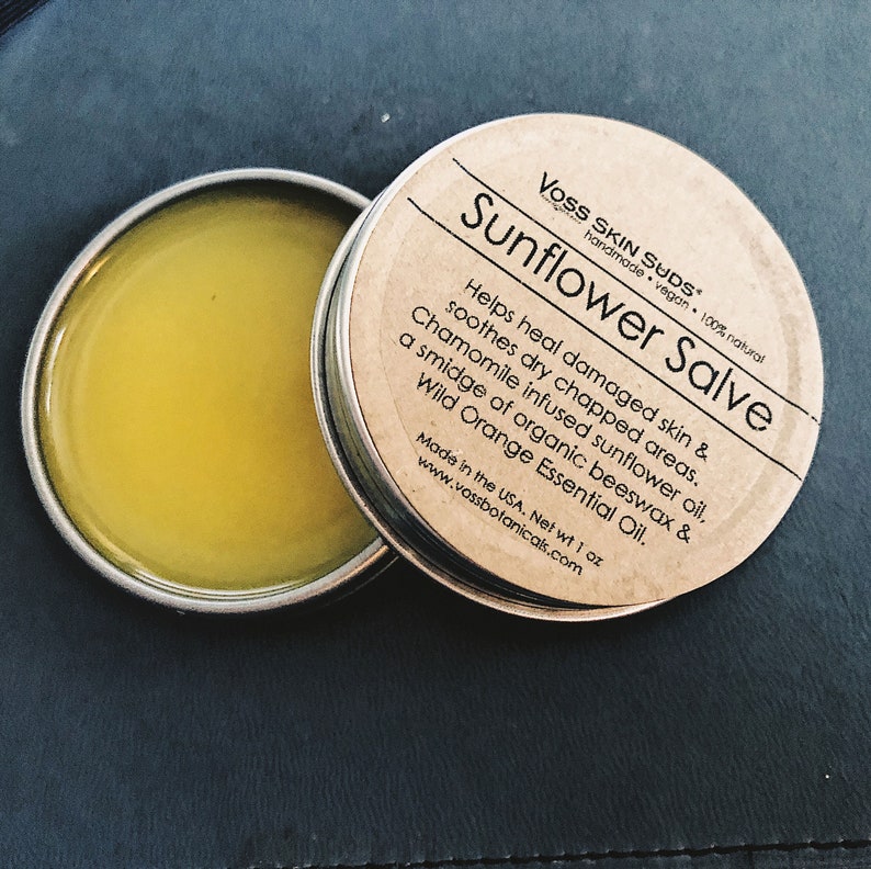 Sunflower and orange salve. Helps soothe dry chapped areas.