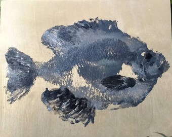 Beautiful gyotaku fish print on wood.