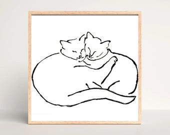 Könnte beinhalten: Ein gerahmter Kunstdruck mit einer minimalistischen schwarzen Strichzeichnung von zwei sich umarmenden Katzen. Die Katzen sind in einem einfachen, eleganten Stil dargestellt, wobei ihre Körper ineinander verschlungen sind. Das Kunstwerk befindet sich vor einem weißen Hintergrund in einem hellen Holzrahmen.