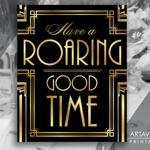 Puede incluir: Señal imprimible negra y dorada con un diseño art déco. La señal dice "Have a Roaring Good Time".