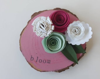 Decorative Wood Slice featuring the word bloom, spring decor with unique paper flowers, painted wood slice