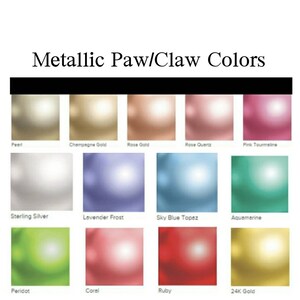 May include: A chart showing 12 different metallic colors for paw or claw colors. The colors are: Pearl, Champagne Gold, Rose Gold, Rose Quartz, Pink Tourmaline, Sterling Silver, Lavender Frost, Sky Blue Topaz, Aquamarine, Peridot, Coral, and 24K Gold.