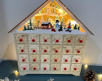 Christmas wooden advent house, adult and children alike, countdown to Christmas, December 1st, snowman, sleigh, winter scene