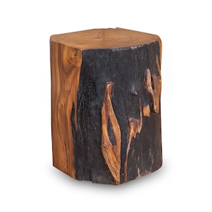 May include: A wooden stool made from a tree trunk with a dark brown and natural wood finish.