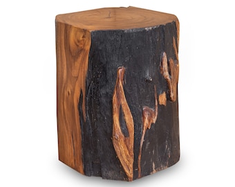 May include: A wooden stool made from a tree trunk with a dark brown and natural wood finish.