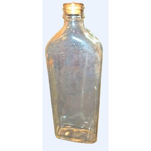 Antieke glazen fles met reliëf Dr. Caldwell doorzichtige kurk