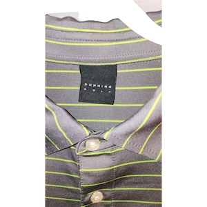 May include: Gray polo shirt with neon green horizontal stripes. The shirt has a button-down collar and the brand name "DUNNING GOLF" is visible on a black tag.