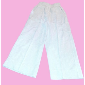May include: White and light blue striped wide-leg pants with pockets. The pants have a high waist and a relaxed fit, perfect for casual wear. The fabric appears to be lightweight and breathable, suitable for warmer weather.