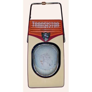 May include: Vintage transistor AM/FM radio with a cream-colored body, orange top, and a silver speaker grill. The word "TRANSISTOR" is printed across the top. Features a handle for carrying.