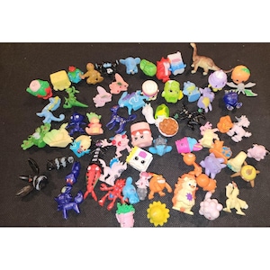 Kavel van 63 geassorteerde miniatuur dierenfiguurfiguren Speelgoed Shopkins