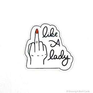 May include: Black and white sticker with a hand giving the middle finger and the text "like a lady".