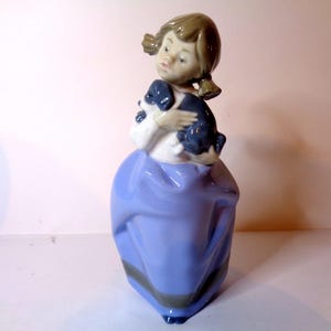 NAO by Lladro Girl with Sleepy Puppy number 1029