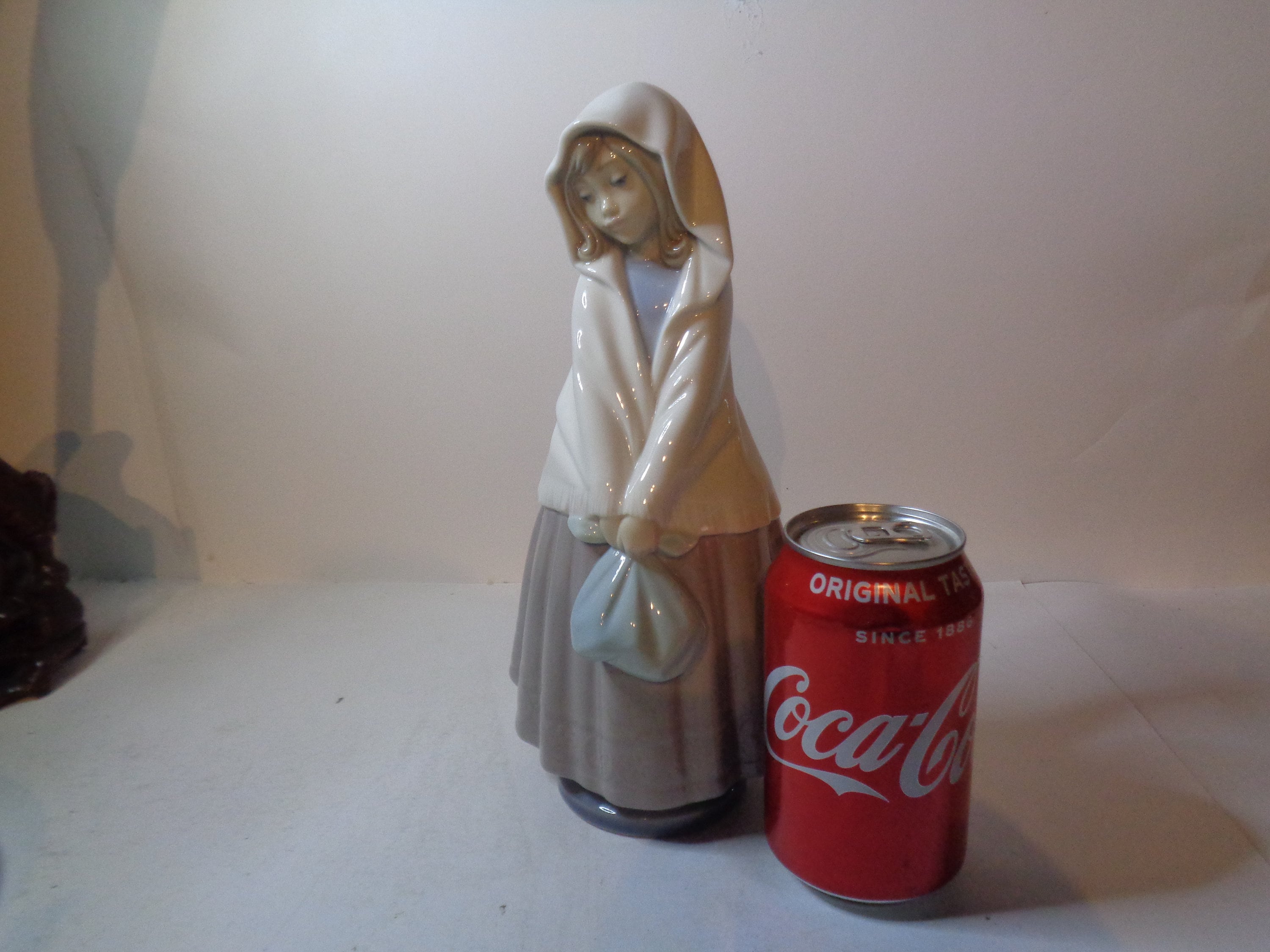 NAO by Lladro Girl on her travels with shawl and bundle
