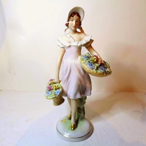 Royal Dux Girl with Baskets of Flowers