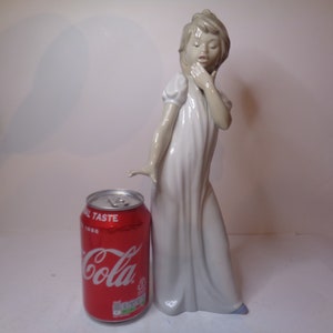 NAO by Lladro Young Girl startled by something