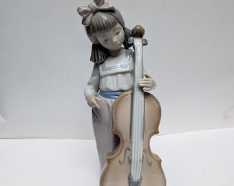 NAO by Lladro Young Girl Playing the Cello
