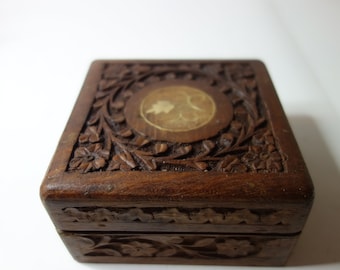 Deep carved wooden box inlaid top