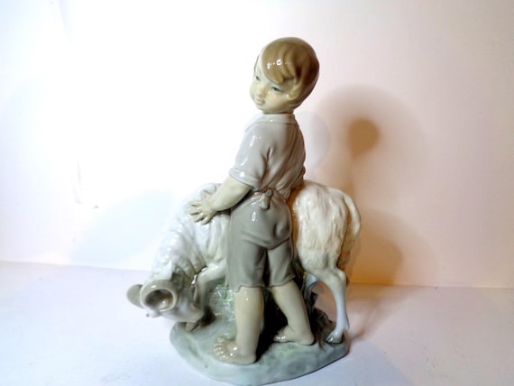 Boy and Girl Porcelain Hand Crafted Figurines From NAO Spain