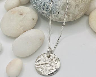 Silver Starfish imprint necklace.