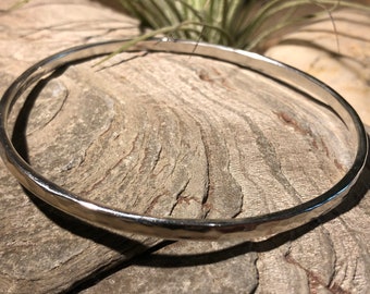 Silver textured bangle.