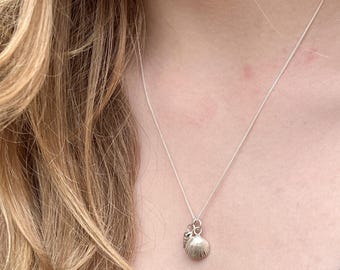 Silver Bantham shell necklace.