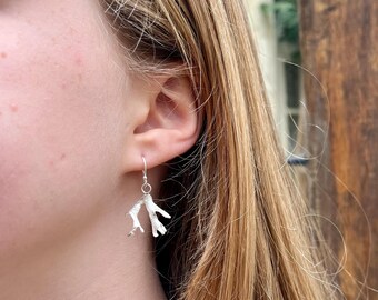 Seaweed dangly earings.