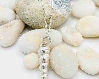 Large Silver spiral shell necklace.