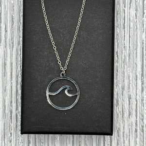 Asri Wave Necklace, wave pendant, sea necklace, wave jewellery, wave symbolism, ocean pendant, surfer necklace, surfer pendant