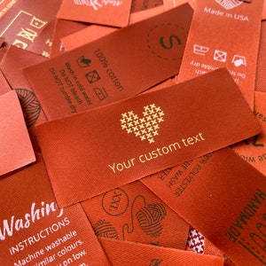 Custom Color Satin Woven Clothing Labels: Gold, White, Red Inks