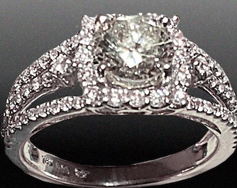 Diamond Ring, 14k white gold setting with smaller accent diamonds on top and shoulders.
