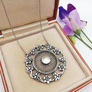 c1910 CHARLES HORNER attr Arts and Crafts narcissus pendant in silver with MOP