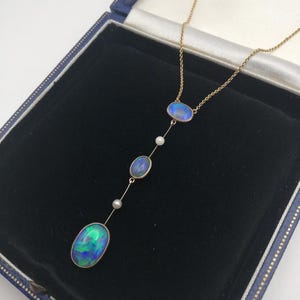 Rare Edwardian 9ct gold and black opals lavalier necklace of superlative quality