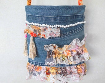 Bag from blue jeans and multicolored lace