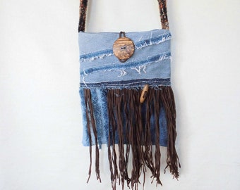 Bag from blue jeans and brown fringes