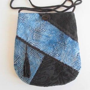 Elegante Tasche mit langem Henkel