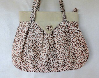 Shoulder bag in brown and beige