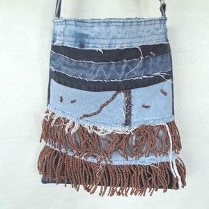 Blue jeans-bag with adjustable handle