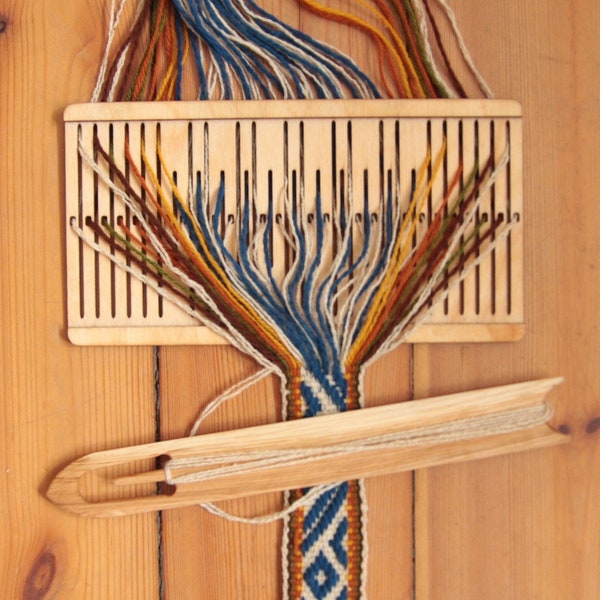 Heddle with shuttle.  11 double slot pattern rigid heddle and hardwood shuttle.band weaving, backstrap weaving, sami weaving, patterned band