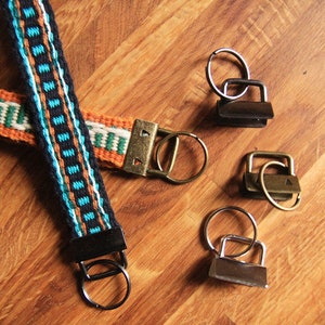 Projeto de tecelagem de ferragens Fob finalizando para cordão, pulseira, chaveiro, pulseira, é uma ideia de presente