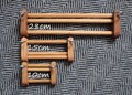 Best bandlock, horse bar, waist clamp, band weaving, rigid heddle loom, belt weaving, weaving harness, band lock for backstrap weaving,inkle product logo