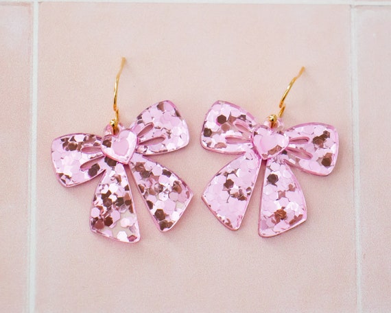 Pink bow sales earrings