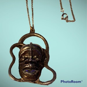 Vintage Tribal Mask Pendant, free Form Frame, Bass Pendant, African Mask wit( h Chain