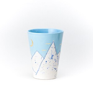 Light Blue Ceramic Cup Crayon Drawing Mountain Blue Sky GOLD moon and birds Handmade by Iana Kaisheva